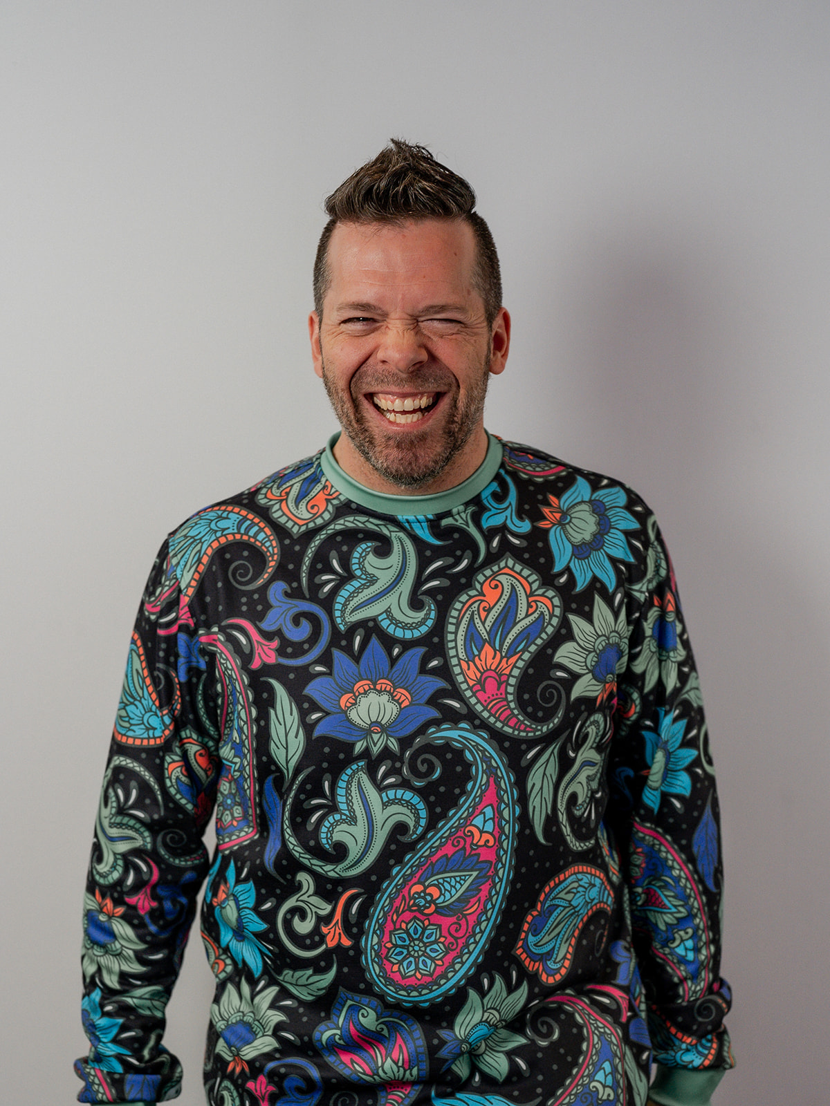 DJ Kyle Mac in vibrant paisley shirt